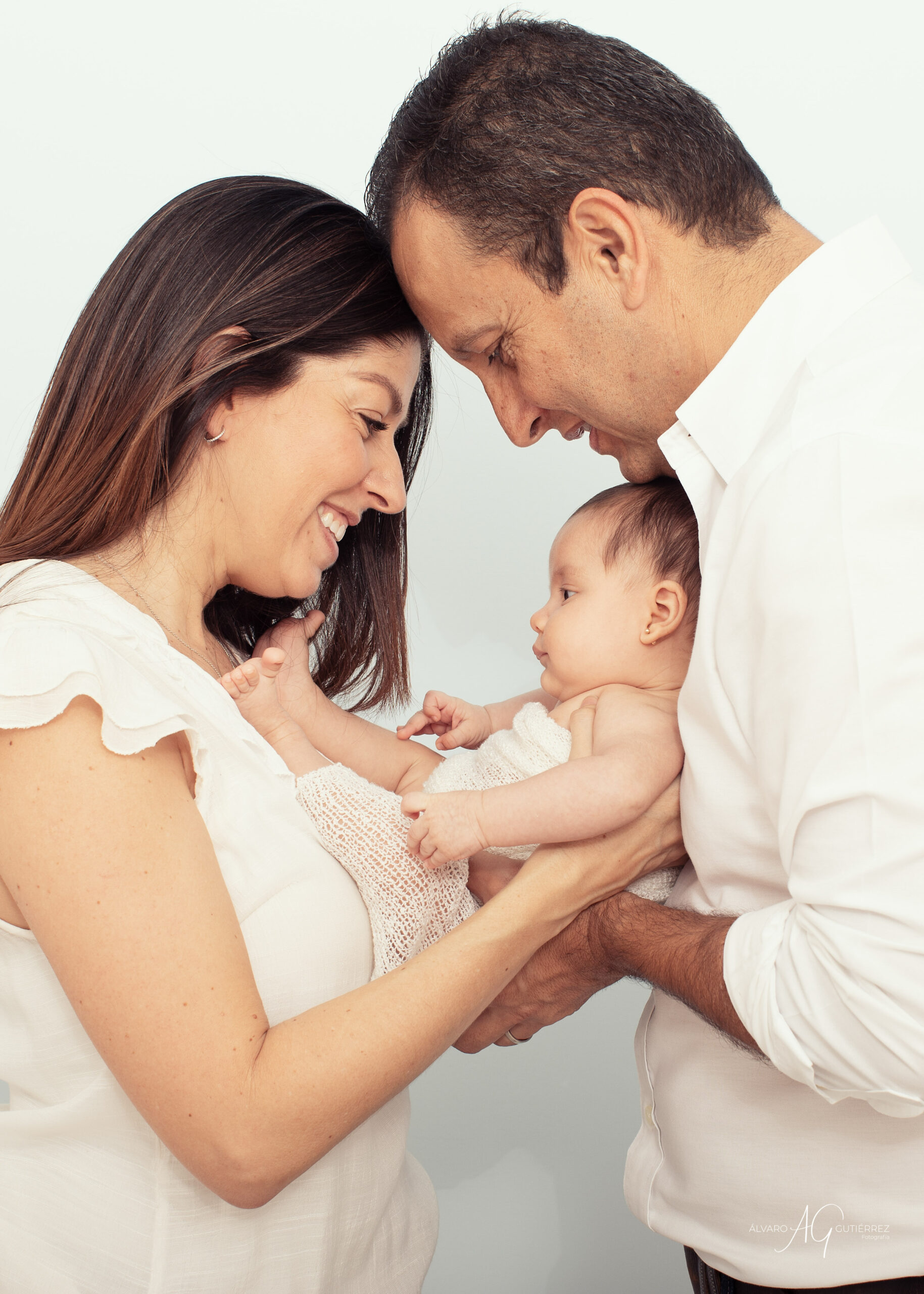 Happy family with newborn child